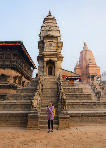 istock Woman with camera exploring Bhaktapur 1755521538