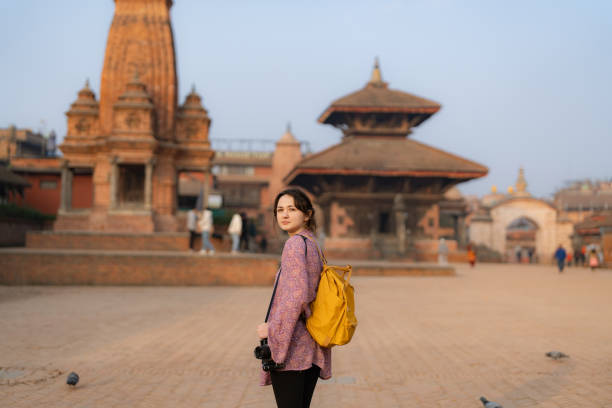 istock Woman with camera exploring Bhaktapur 1755524961