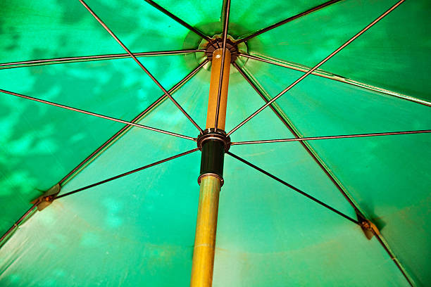 istock open umbrella to protect against sun 175553532