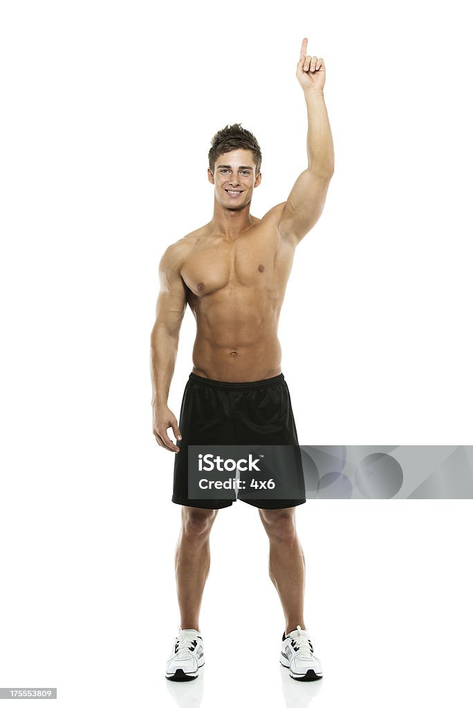上半身裸の男性のポートレート、指を指す上向き - 1人のロイヤリティフリーストックフォト