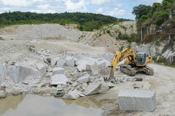 istock heavy machinery at mining site 1755555281