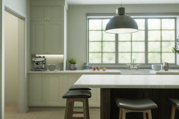 istock Kitchen interior with an island with a white stone countertop - for placing and advertising products against the blurred background of the kitchen by the window. 3D rendering 1755570310
