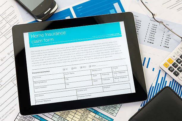 istock Home insurance claim form on a digital tablet 175557304