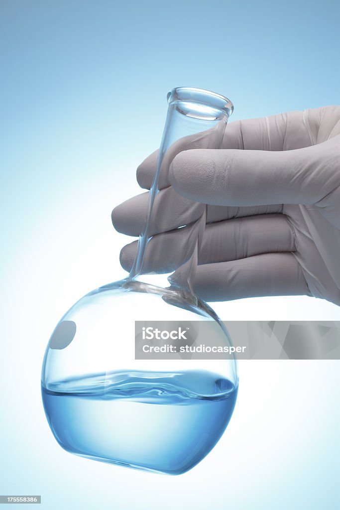 The Solution Gloved Hand Holding Flask Analyzing Stock Photo