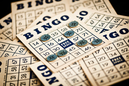 Vintage bingo cards and markers