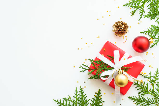 istock Christmas Present box and decorations at white background. 1755594292
