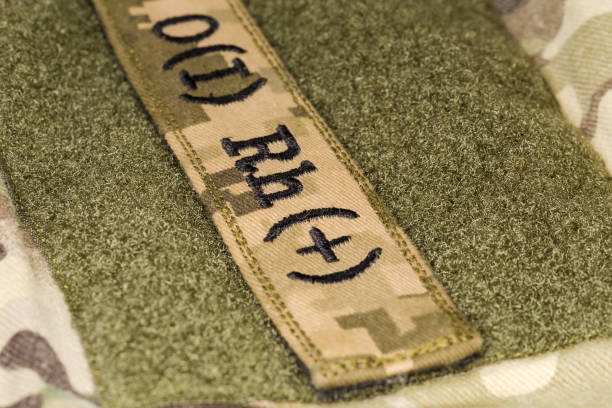 istock Military blood type sticker on a camouflage uniform 1755594815