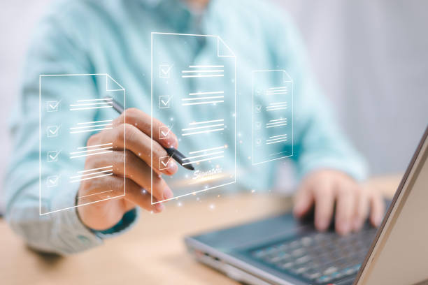 istock E-signing, Digital electronic signature, document management, paperless business office. Businessman sign e document digital computer, release electronic  pencil mobile technology, Online contract 1755598948