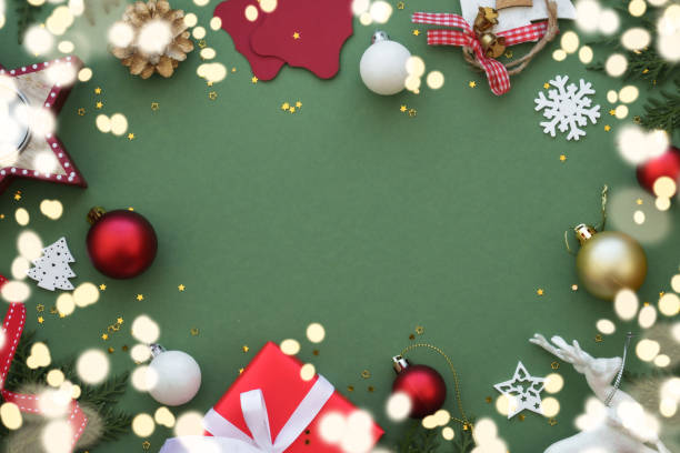 istock Christmas Present box and decorations at red background. 1755600680
