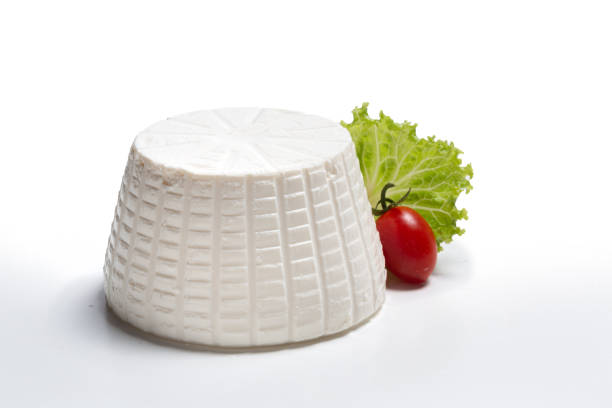 istock fresh ricotta with salad leaf and cherry tomato on white background top view 1755609462
