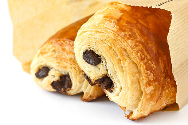 istock Chocolate croissants in brown bag 175561046