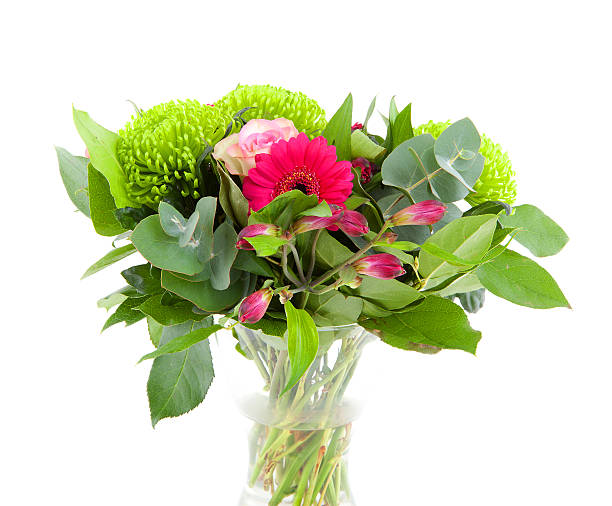 Bouquet of spring flowers in a glass stock photo