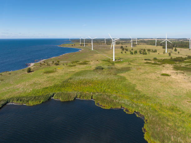 istock Coastal landscape with wind turbines 1755635014