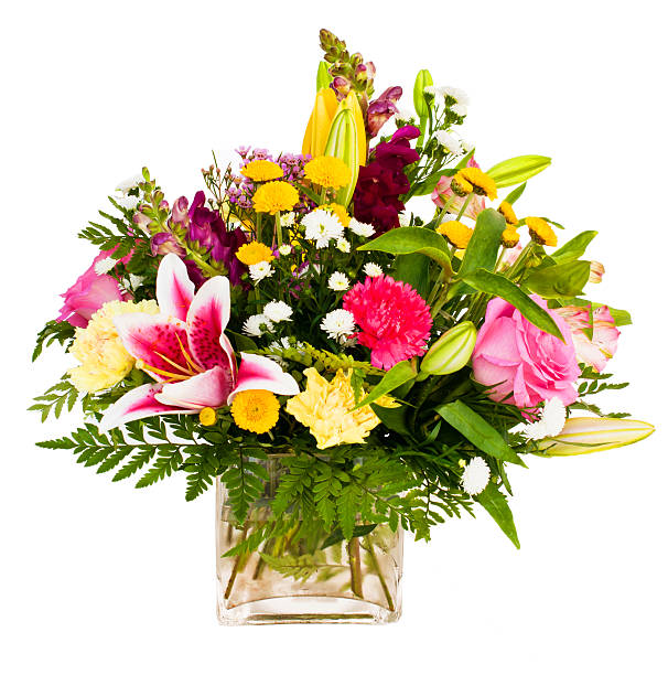 Colorful spring flowers bouquet in vase isolated on white