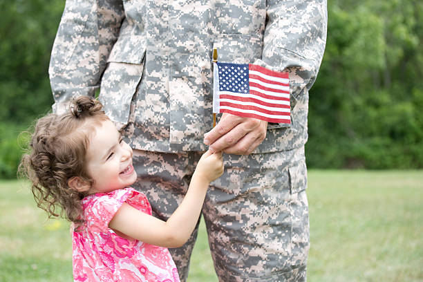 istock girl with soldier 175567090