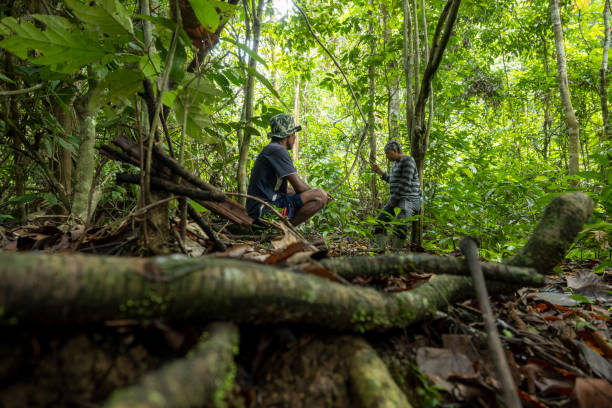 istock Two Men Resting in the Forest - Stock Photo 1755672068