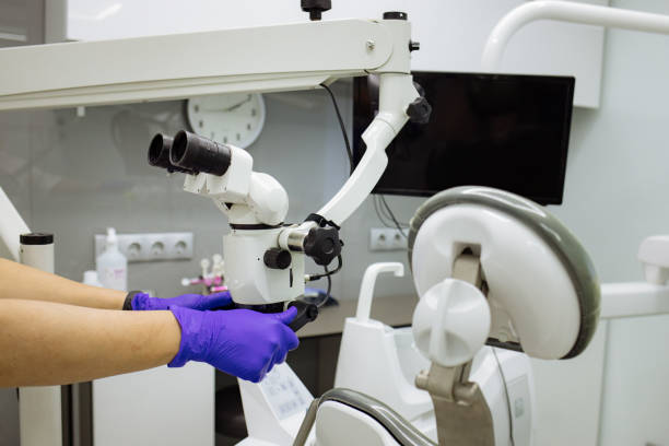 istock close-up of dentist's hands. Manipulating a dentist's instrument 1755681363