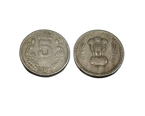 five rupees coin Indian old coin. on white background. Rupees, Indian Currency coins money, business real estate concept.