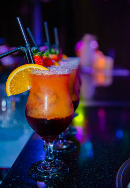 istock Alcoholic cocktail with ice on a bar counter, night club 1755720617