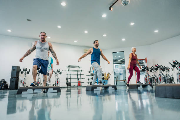 istock People exercising in an exercise class at the gym 1755727436