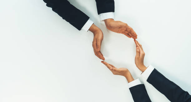 istock Business people join hand as frame for copyspace. Shrewd 1755744527
