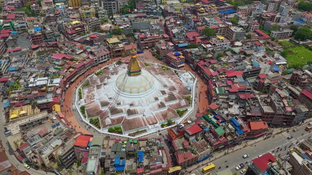 Boudhanath Stupa Towering Over The Townscape Of Kathmandu, Nepal, South Asia. Aerial Drone Shot