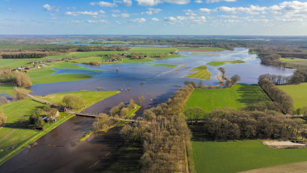istock Vecht river high water level flooding at the Junne weir drone view 1755750849