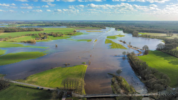 istock Vecht river high water level flooding at the Junne weir drone view 1755753717
