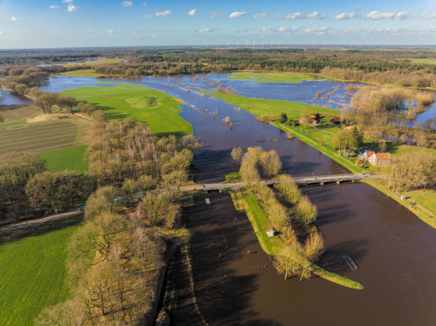 istock Vecht river high water level flooding at the Junne weir drone view 1755754283