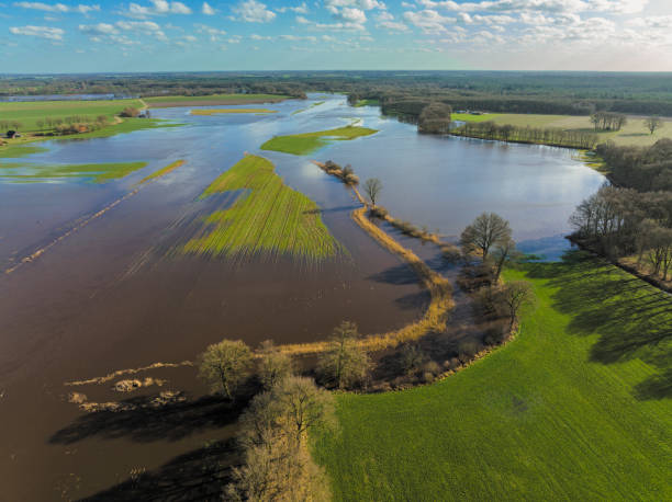 istock Vecht river high water level flooding at the Junne weir drone view 1755755406