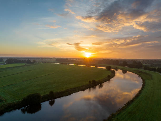 istock Vecht river sunrise seen from above during autumn in Overijssel, Netherlands 1755755437