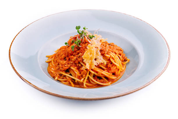 istock Spaghetti bolognese with parmesan cheese and tomatoes 1755756588