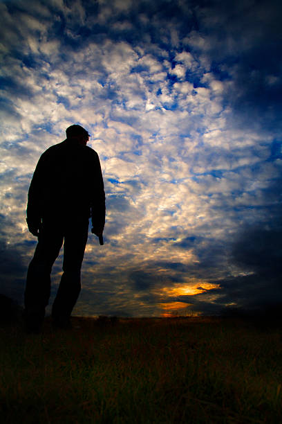 istock The silhouette of man holding gun 175575893