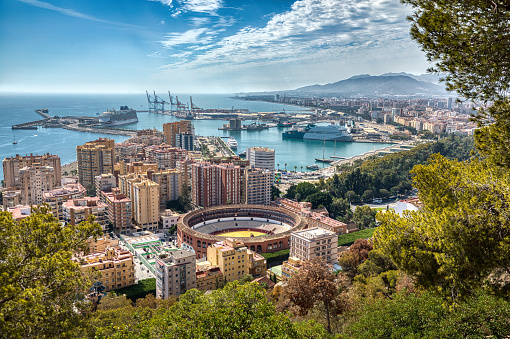 View of sea, mountains, harbor and city of Malaga Spain. Andalusia.