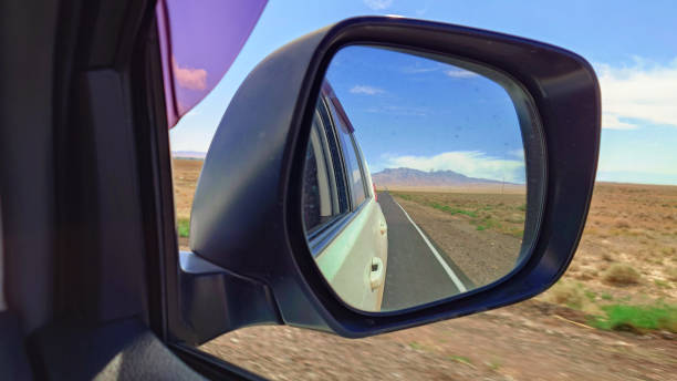istock View from the car interior in the side mirror 1755762180
