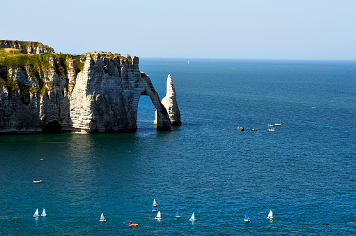 France, Normandy, sailing boats and rock formation in Etretat