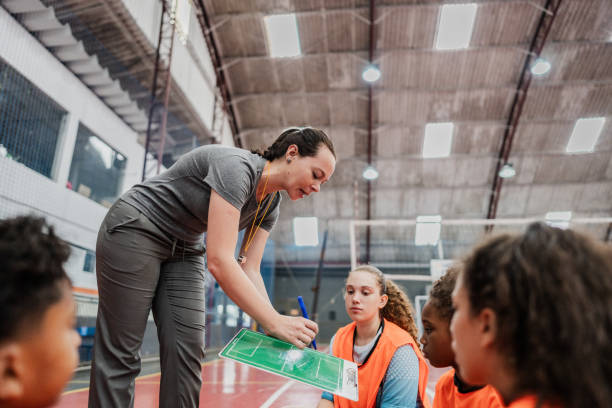 istock Coach talking to team at a sports courts 1755781729