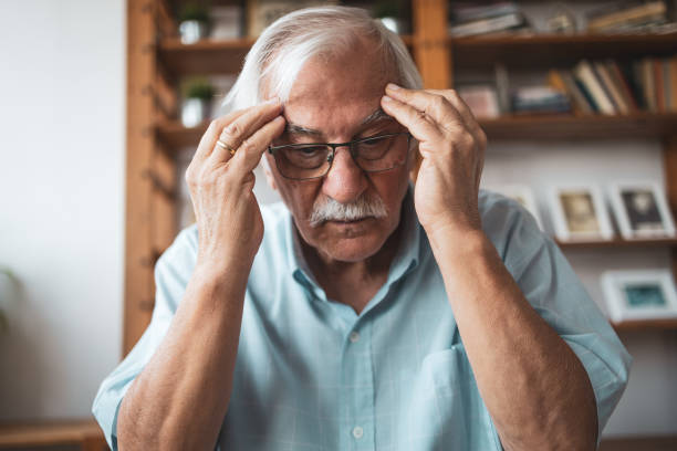 istock Close up photo of the senior man with head pain 1755783473