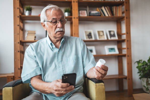 istock Senior man taking medicine 1755784575