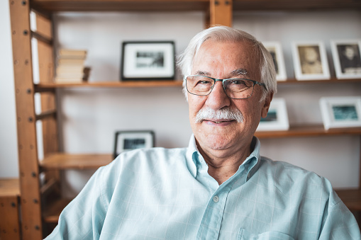 Portrait of smiling senior man looking at the camera