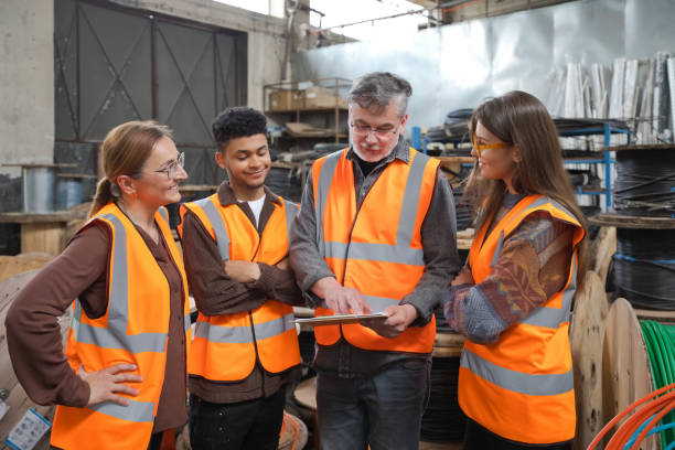 istock Group of recycling coworkers in warehouse 1755802039