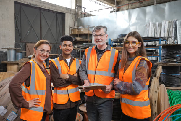 istock Group of recycling coworkers in warehouse 1755804742