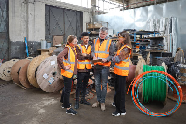 istock Group of recycling coworkers in warehouse 1755804779