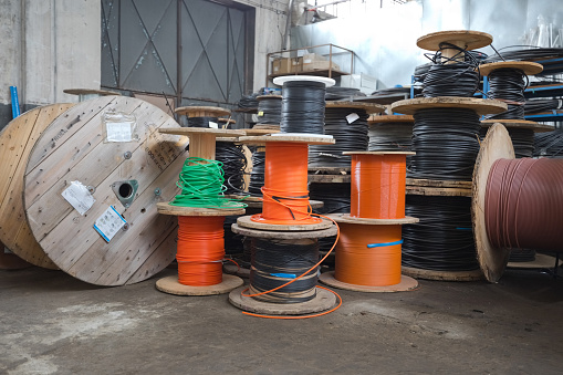 stainless wire stock in coils in industrial tool shop