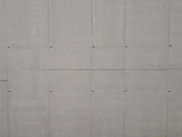 istock background with concrete wall building with decals after pouring cement mixture into formwork boards with screws. holiday greetings, advertising of a construction company. 1755815873