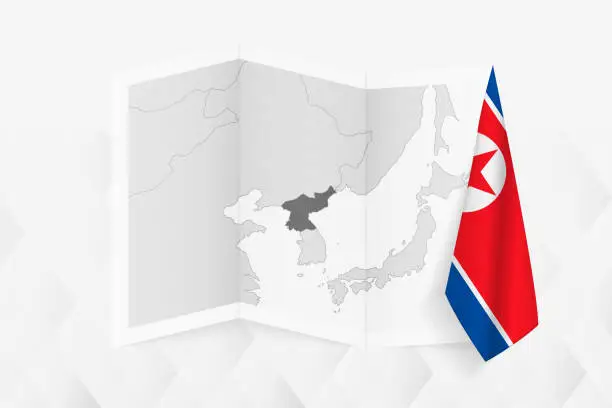 Vector illustration of A grayscale map of North Korea with a hanging North Korean flag on one side. Vector map for many types of news.