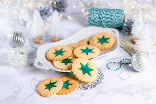 Christmas symbols. Smiling gingerbread men, angel, Christmas tree and snowflake cookies isolated on white background isolated on white background.