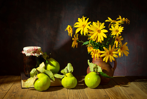 Still life with quinces and flowers