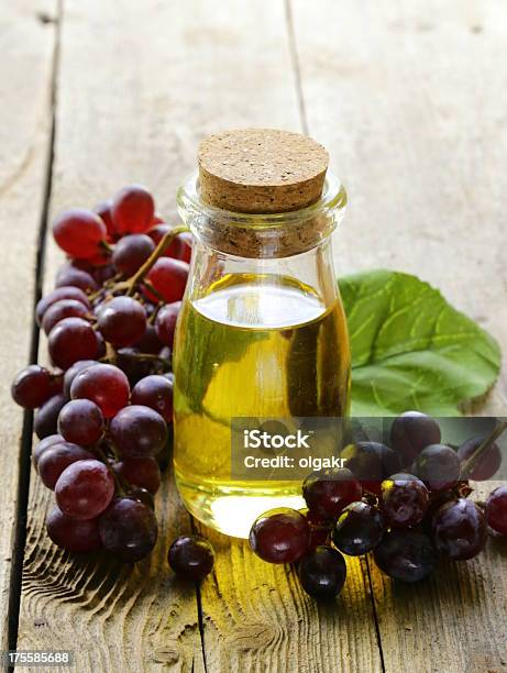 Bottle With Grape Seed Oil Stock Photo - Download Image Now - Cooking Oil, Grape, Seed