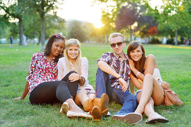 istock Young college students together in the park 175585902